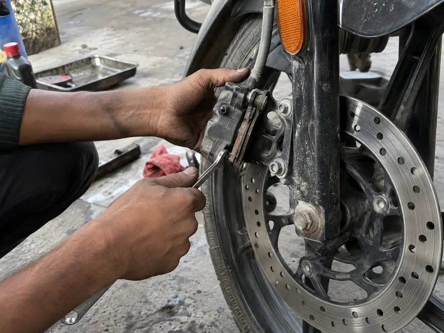 Bike brake pad and disc brake repair at Dinesh Bike Point