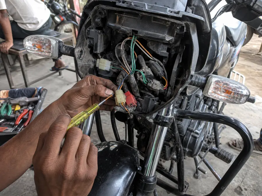 Bike headlight and wiring repair by mechanic